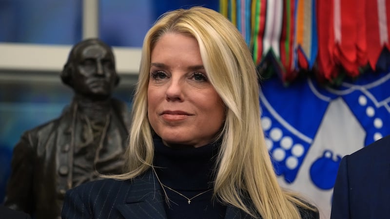 Attorney General Pam Bondi listens as President Donald Trump speaks at an event on addiction...