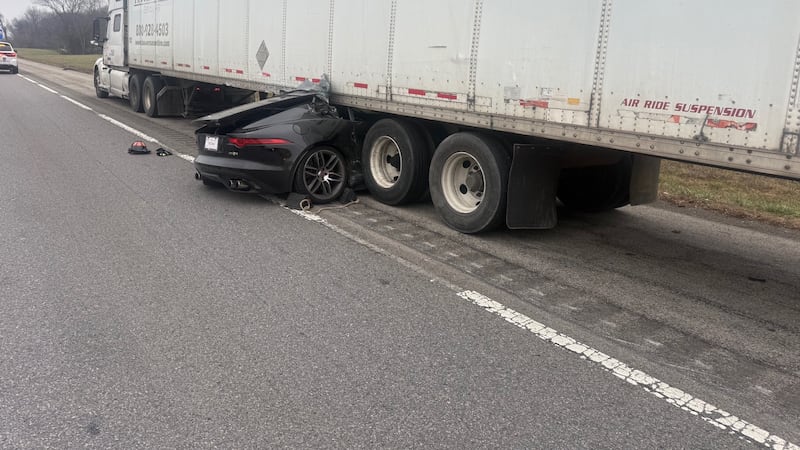 No injuries were reported after a car hit a semi-truck on I-65 earlier Saturday.