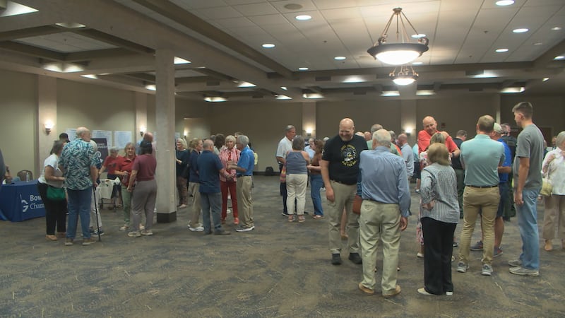 Community members and local officials gathered inside the Knicely Center for open house